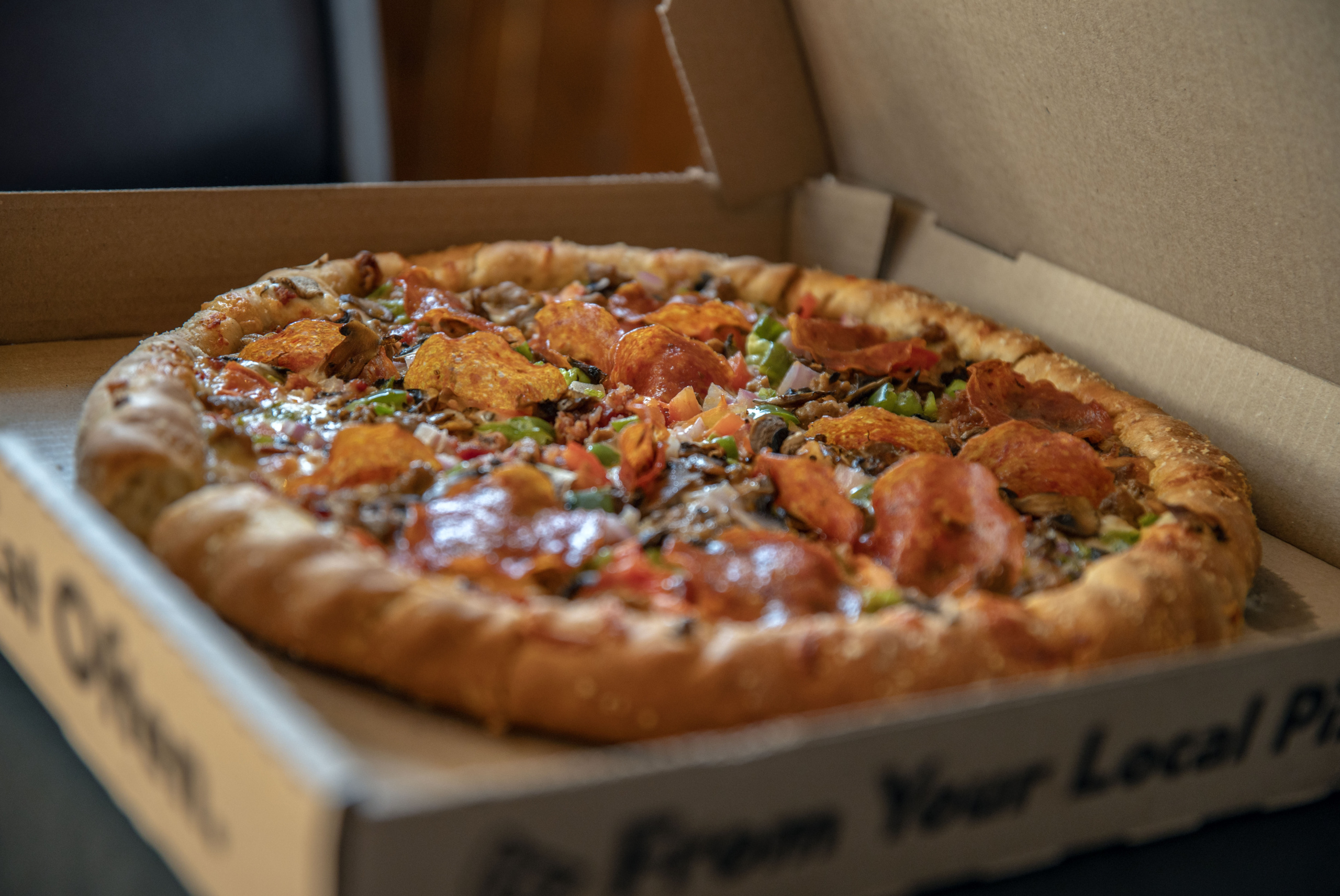 Supreme pizza angled closeup